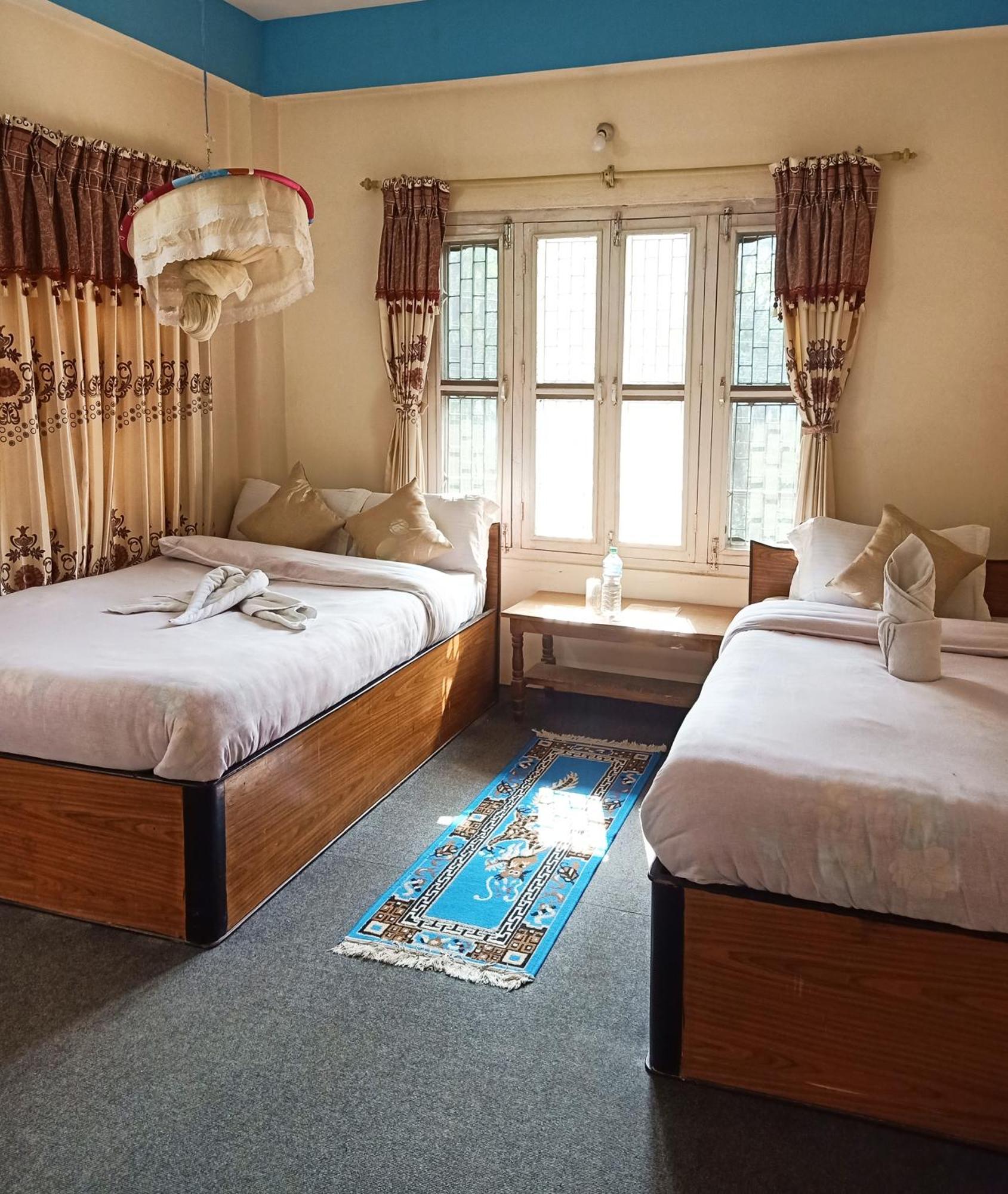 Hotel Rhinoceros-Homestay Sauraha Phòng bức ảnh