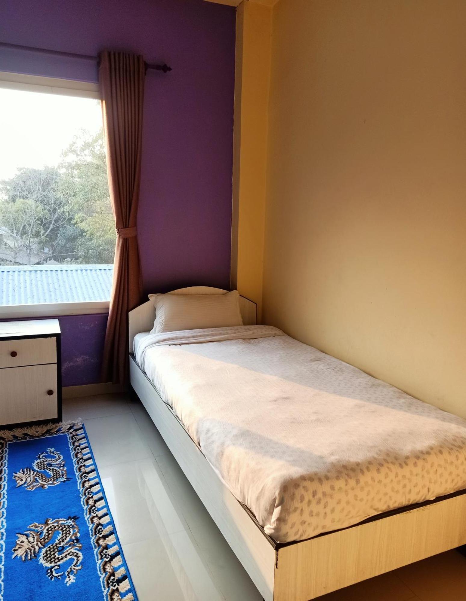 Hotel Rhinoceros-Homestay Sauraha Phòng bức ảnh